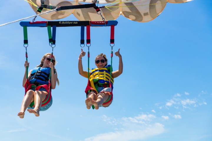 a group of people jumping in the air