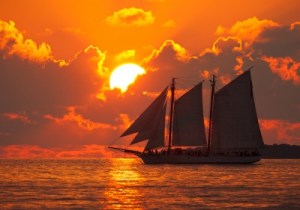 a sunset over a body of water