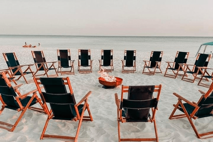 a group of people on a beach