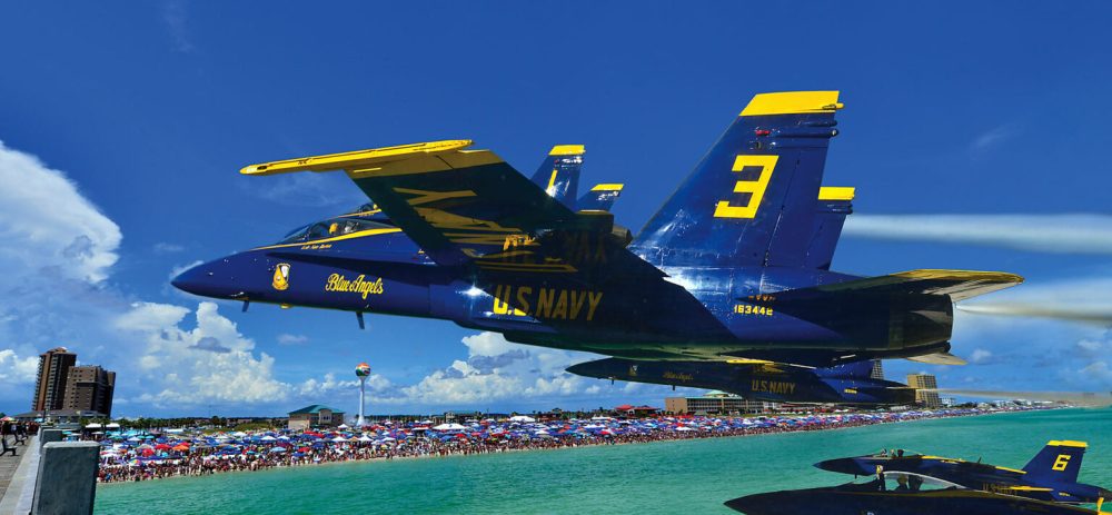 a close up of a fighter jet sitting on top of a boat